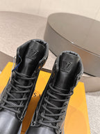 Louis Vuitton unisex black lace-up ankle boots, close-up front with logo embossed collars