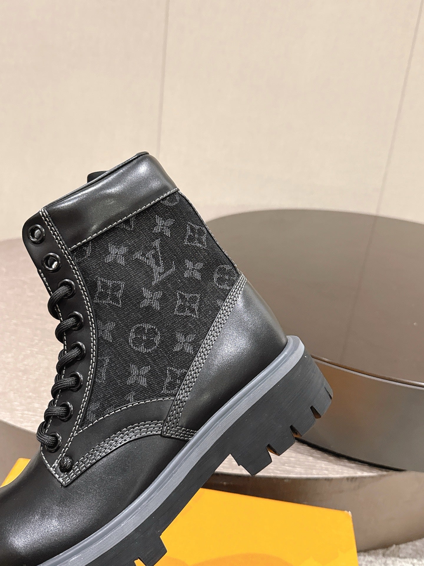 Louis Vuitton unisex black monogram canvas and leather lace-up ankle boot, side angle