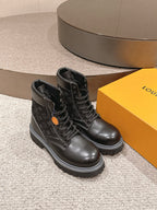 Louis Vuitton unisex black lace-up ankle boots with monogram panels and thick outsole