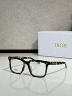 Dior eyeglasses with dark tortoise frame and clear lenses
