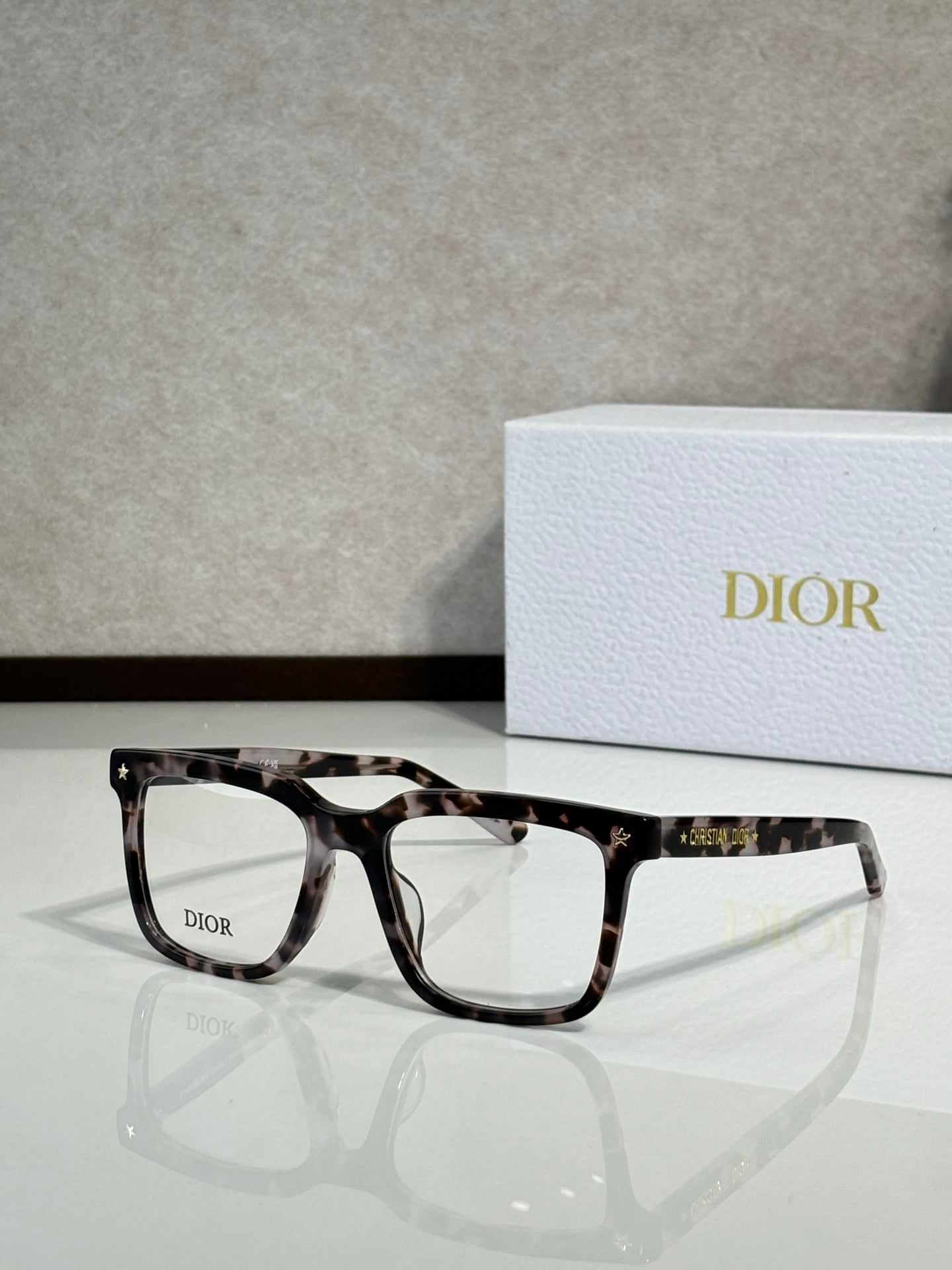 Dior eyeglasses with dark tortoise frame and clear lenses