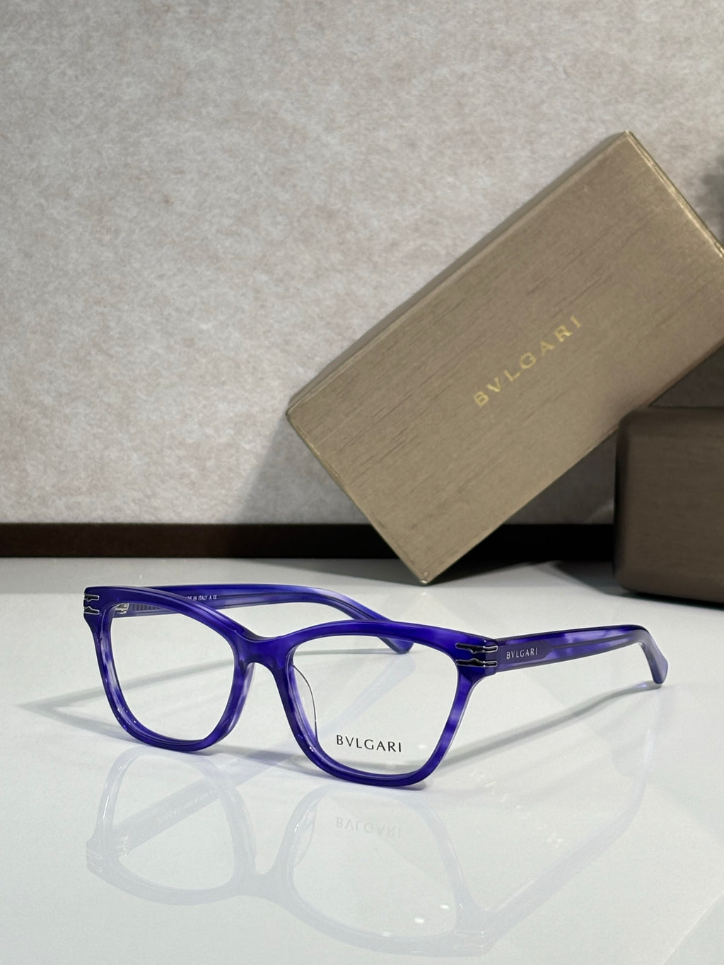 Bvlgari eyeglasses with blue rectangular frames and clear lenses