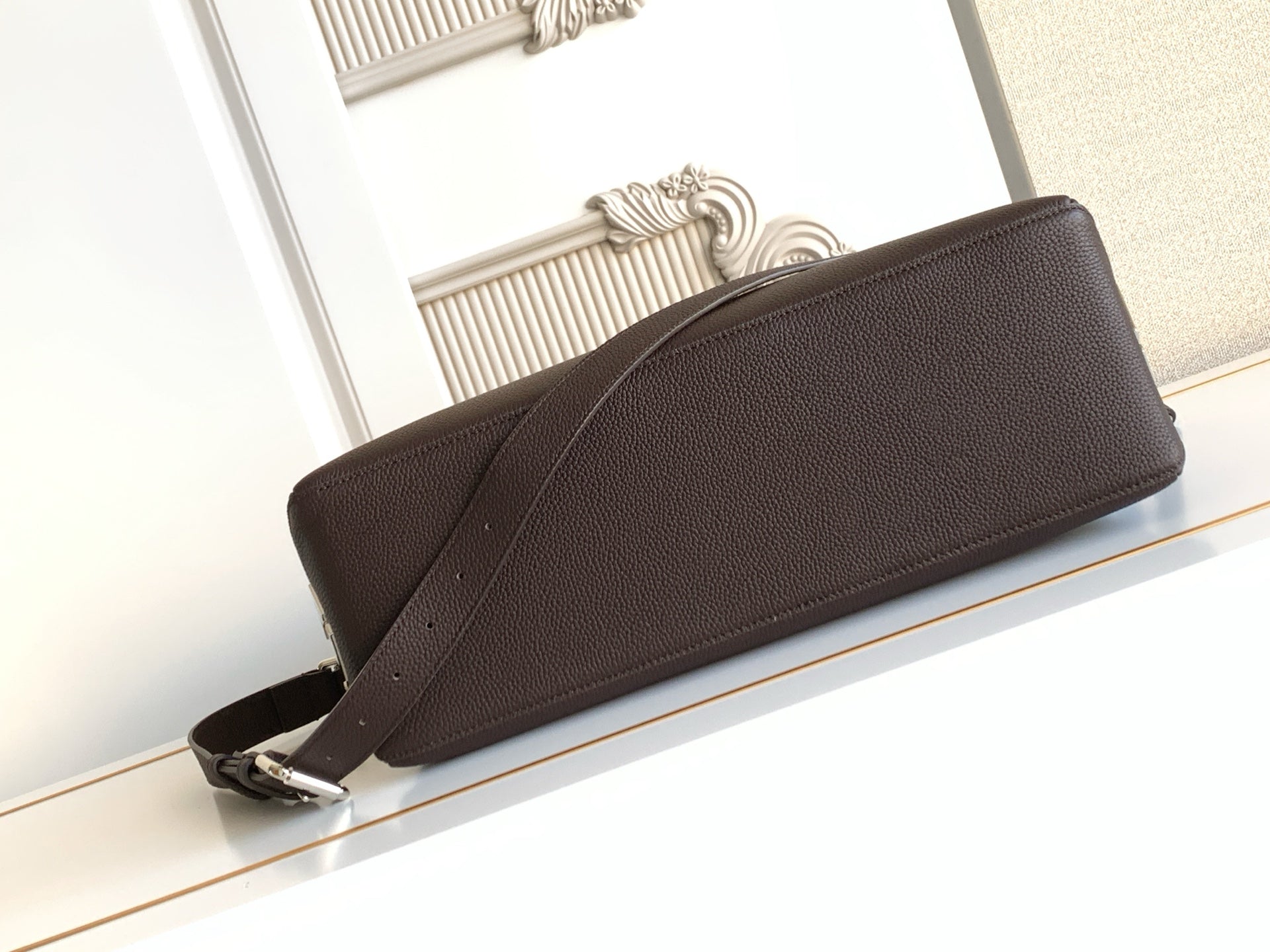 Fendi clutch-style bag in dark brown pebbled leather, long zippered top