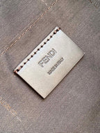 Fendi Made in Italy tag on dark brown pebbled leather bag