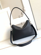 Dark leather shoulder bag with thick strap and front panel stitching