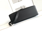 Black leather clutch-style bag with top zipper and long shoulder strap