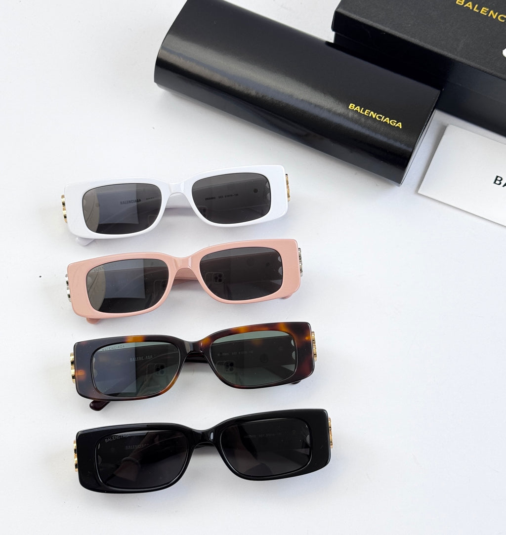 Balenciaga sunglasses assortment in white, pink, tortoiseshell, and black with gold B hardware