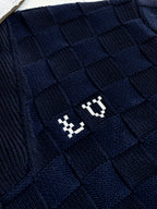 Louis Vuitton navy knit fabric with embossed square pattern and small logo emblem