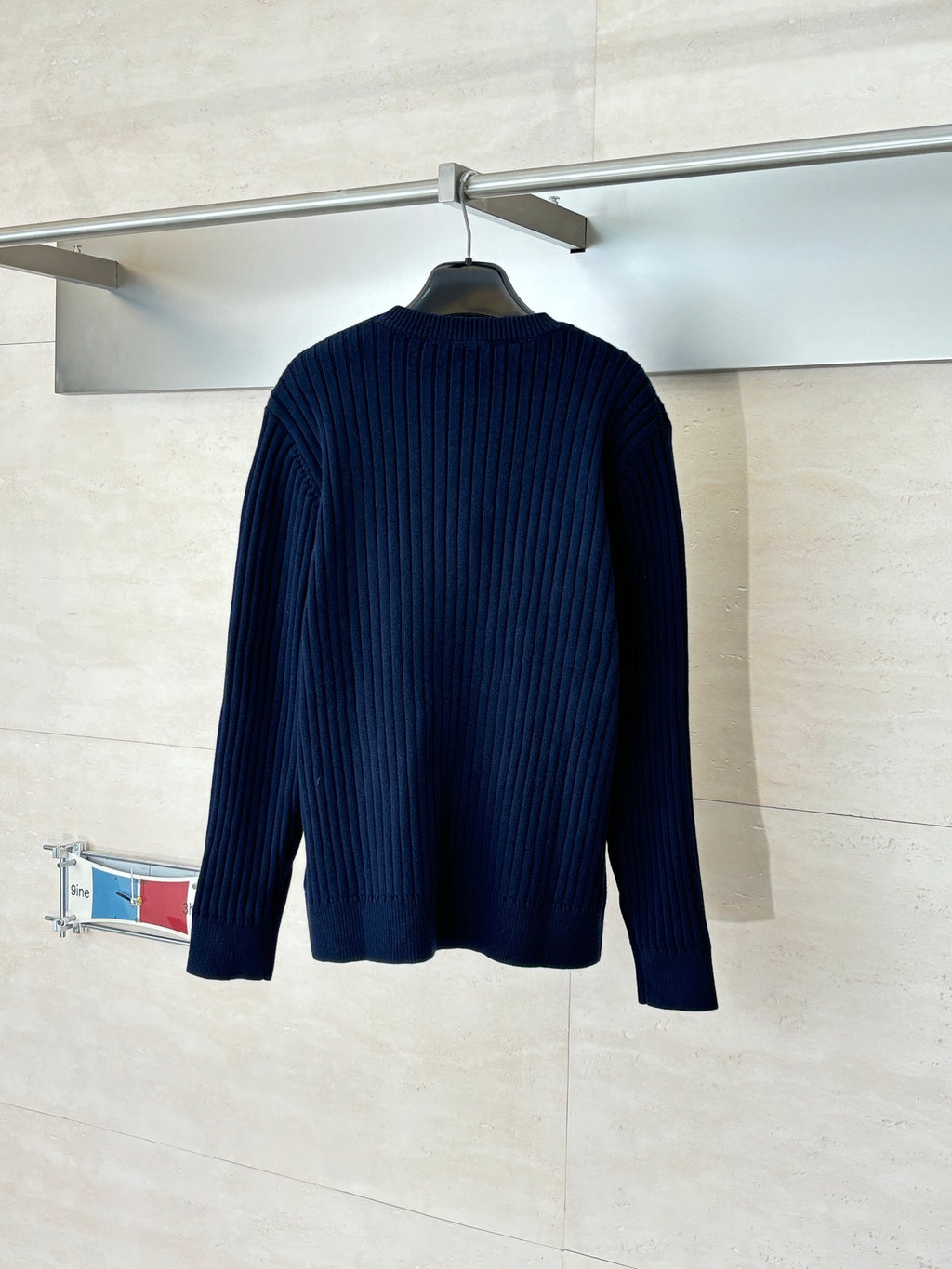 Navy blue long-sleeve knit sweater, crew neck, ribbed knit texture