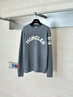 Grey Moncler crewneck sweater with large front logo