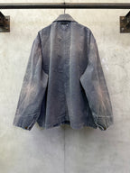 Back view of long denim jacket in dark blue-gray with seam details