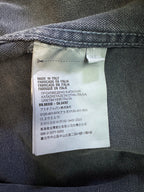 Prada label inside long jacket showing Made in Italy and care text