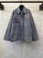 Long denim jacket in dark blue-gray with button front and flap chest pockets