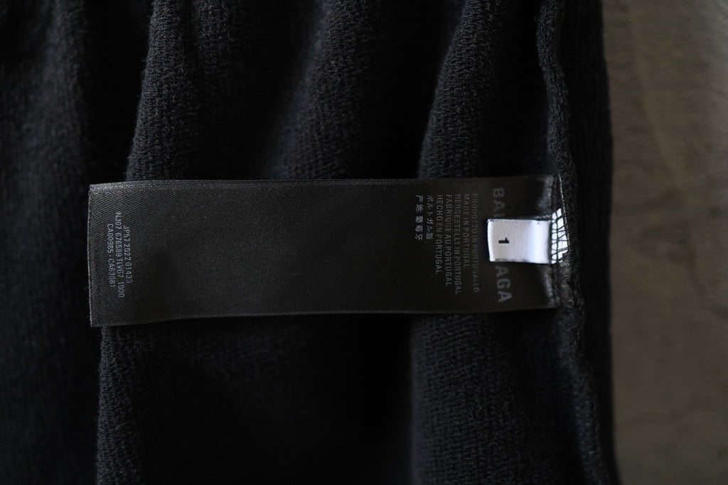Balenciaga dark charcoal pants with interior fabric label tag