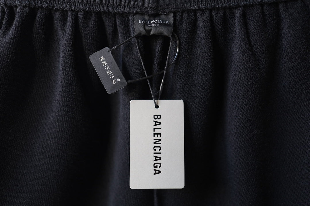 Balenciaga dark charcoal waistband with attached hang tag and logo