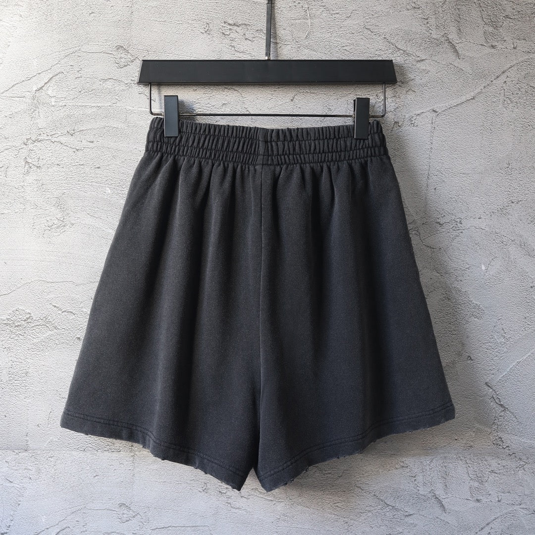 Balenciaga dark shorts with elastic waistband, relaxed straight legs