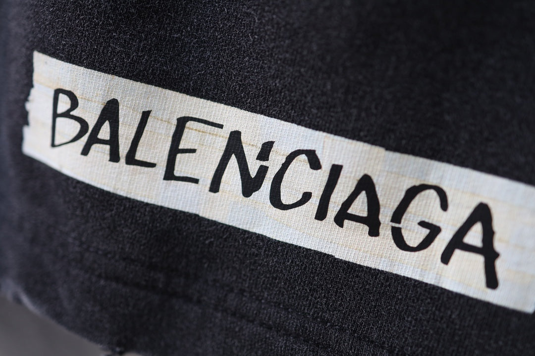 Balenciaga waistband label reading BALENCIAGA on dark shorts