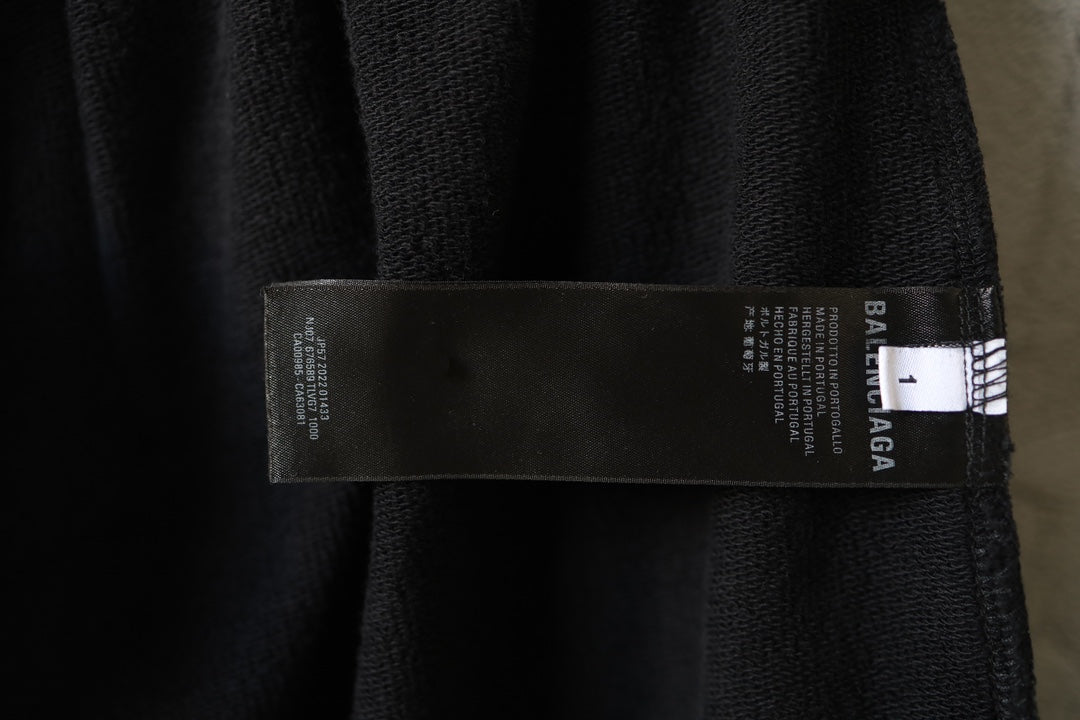 Inside care label on black pants waistband