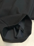 Louis Vuitton pants, black cuff opening with interior lining detail