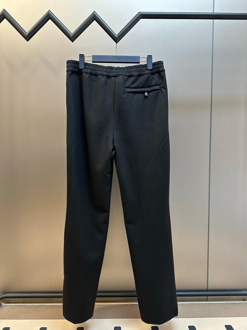 Louis Vuitton dark trousers with elastic waist and drawstring, relaxed straight fit