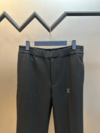 Louis Vuitton dark pants, elastic waist with small gold LV logo on front