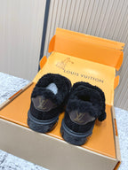 Louis Vuitton black plush slip-on sneakers with logo on heel, back view