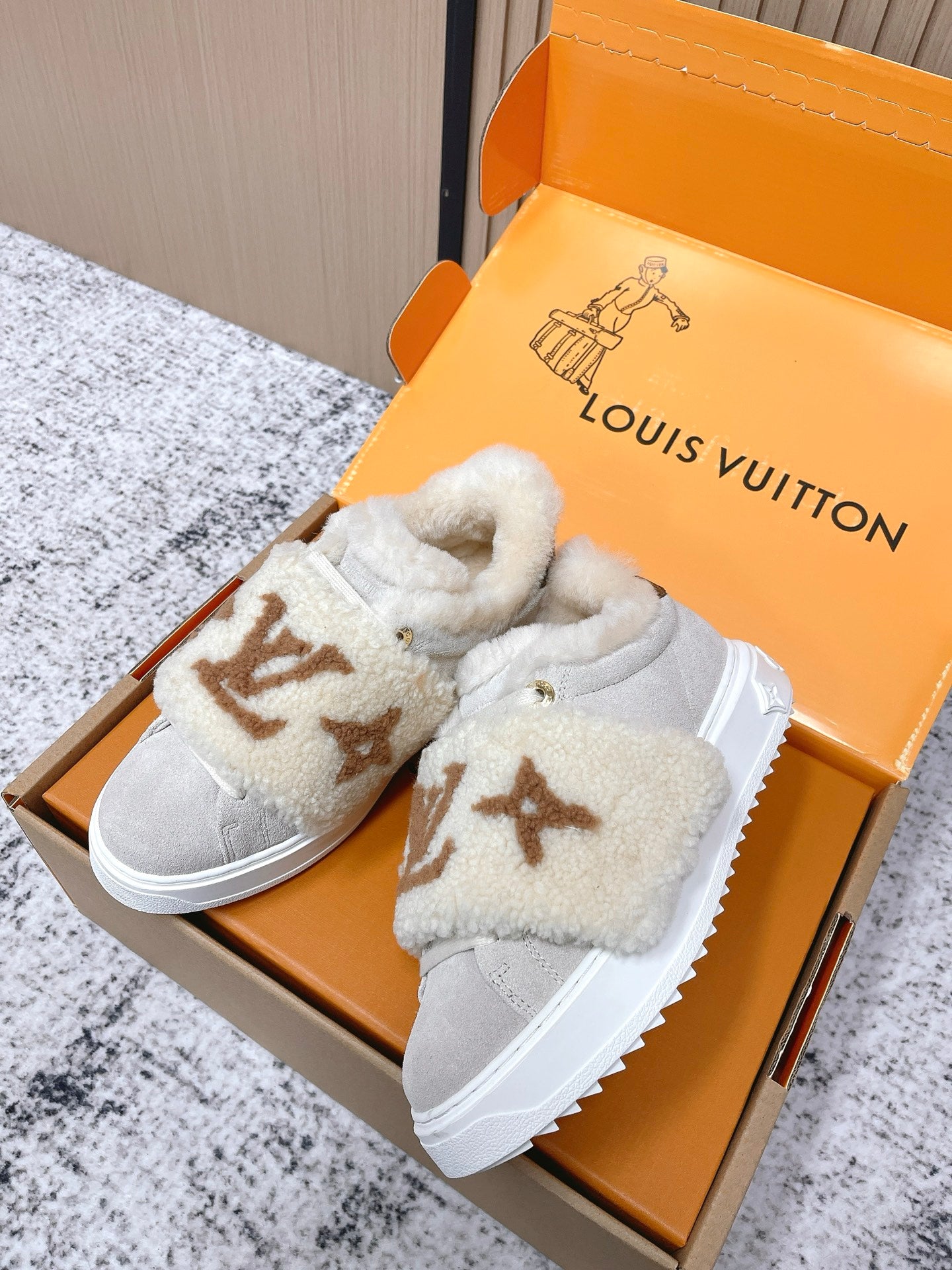 Shearling slip-on sneakers, light gray with tan monogram, white platform sole