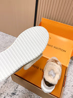 Shearling slip-on sneakers, close view of white ribbed outsole with gray upper