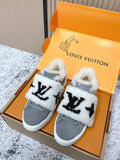 Louis Vuitton unisex sneakers, gray canvas with white sherpa trim and black star-like logo