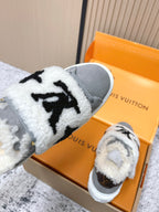 Louis Vuitton unisex sneakers, white sherpa strap with black star-like logo on gray low-top