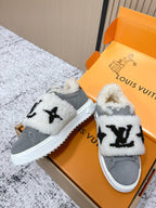 Louis Vuitton unisex sneakers, gray uppers with white sherpa collar and black graphic on strap