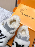 Louis Vuitton unisex sneakers, close-up gray upper with white sherpa trim and logo label