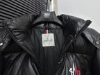 Black puffer jacket interior with white brand label and folded hood lining