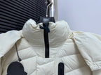Moncler long white puffer jacket with high collar, hood, and front zipper