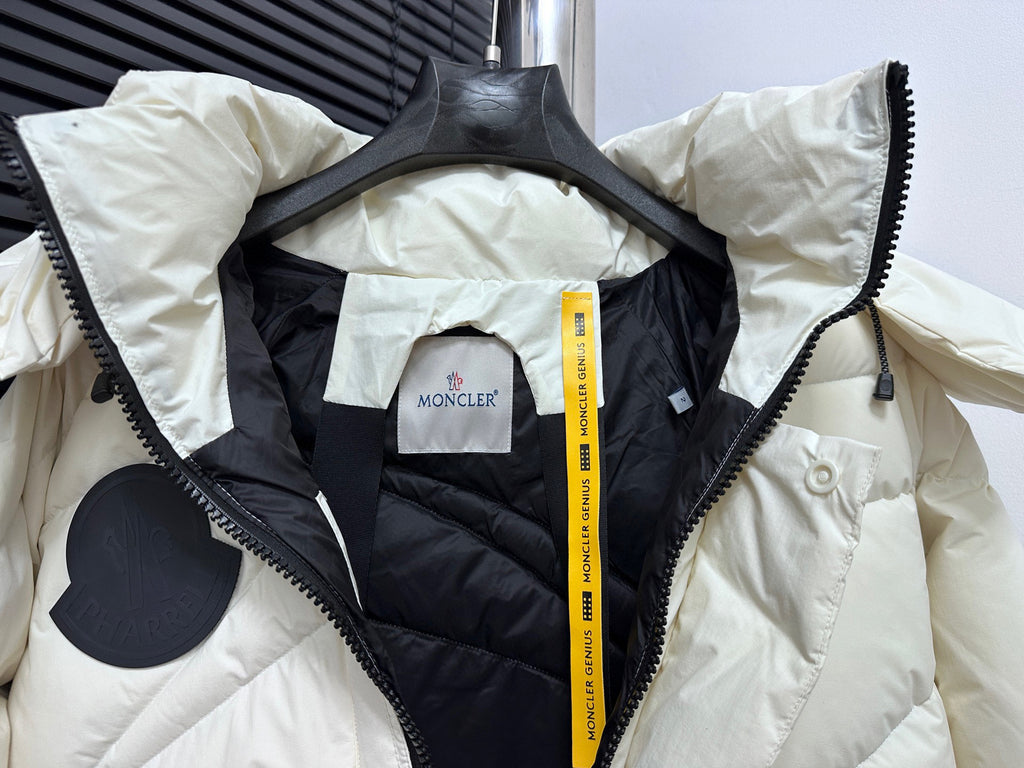 Moncler long white puffer jacket interior lining with hood and black zipper edge