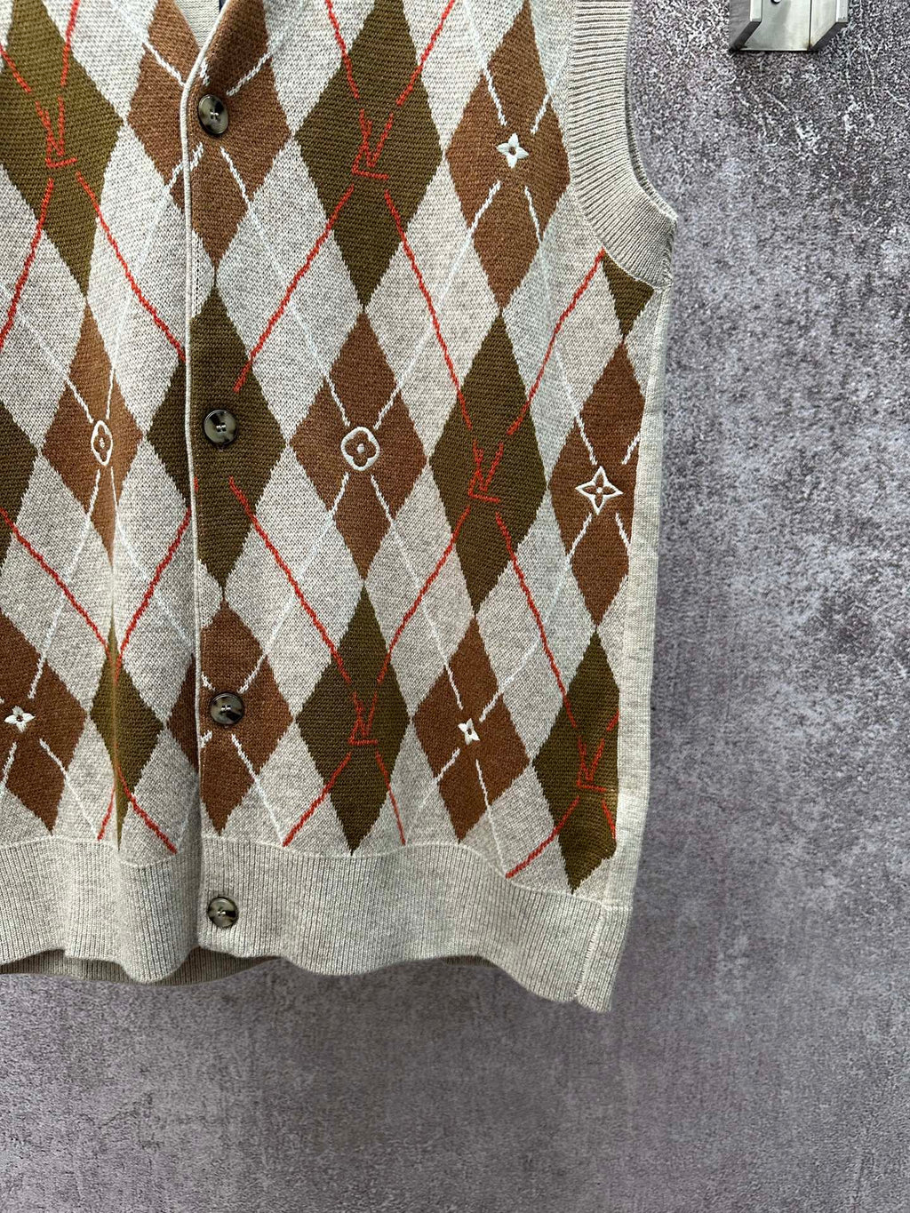 Louis Vuitton argyle sleeveless sweater vest, button front and ribbed hem