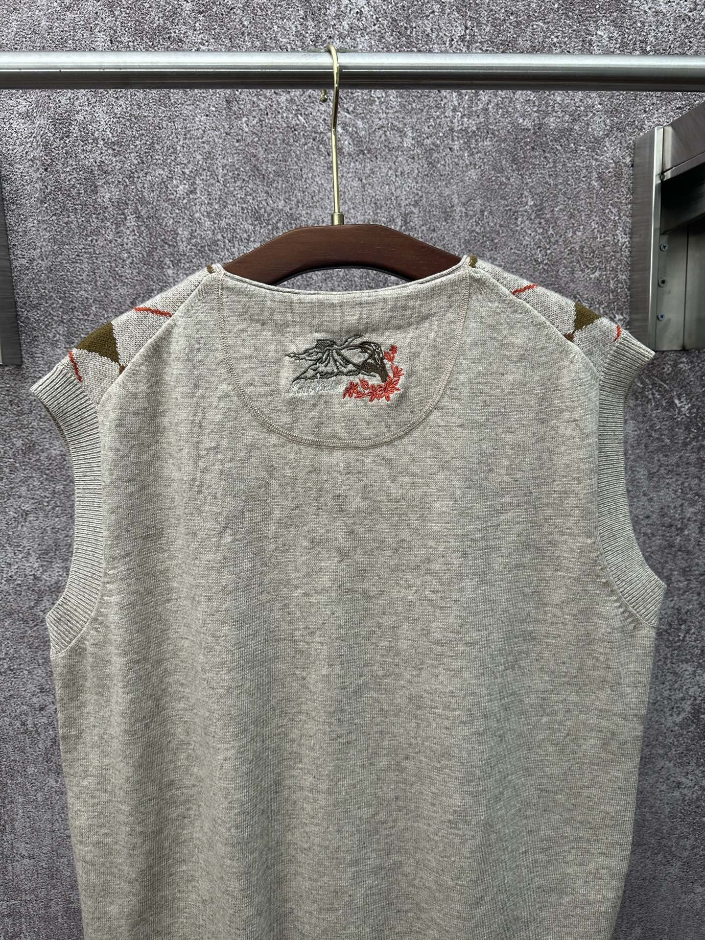 Louis Vuitton sleeveless knit top, light gray with embroidered chest graphic