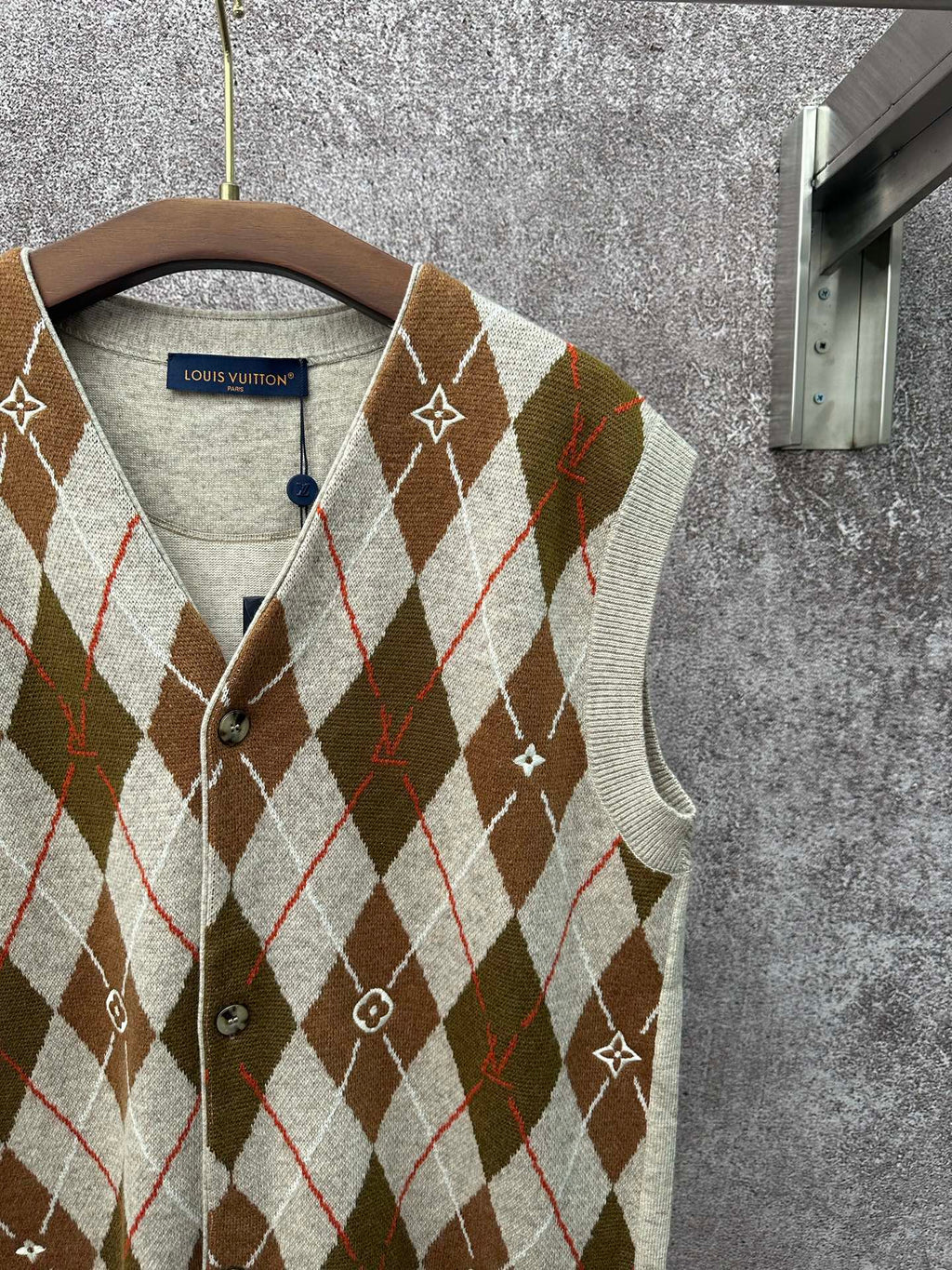 Louis Vuitton argyle sleeveless sweater vest, button front and V-neck collar