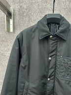 Long puffer jacket, dark green, textured ribbed collar and metal button front