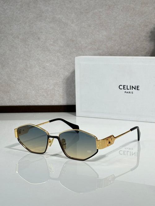 Gold-and-black sunglasses with dark lenses, angled front view