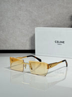 Celine sunglasses with amber rectangular lenses, gold frame, and gold-tone hinges