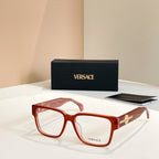 Versace glasses with red square frames and gold emblem on temple arms