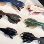 Assorted sunglasses set with blue, pink, green, black, and maroon tinted lenses