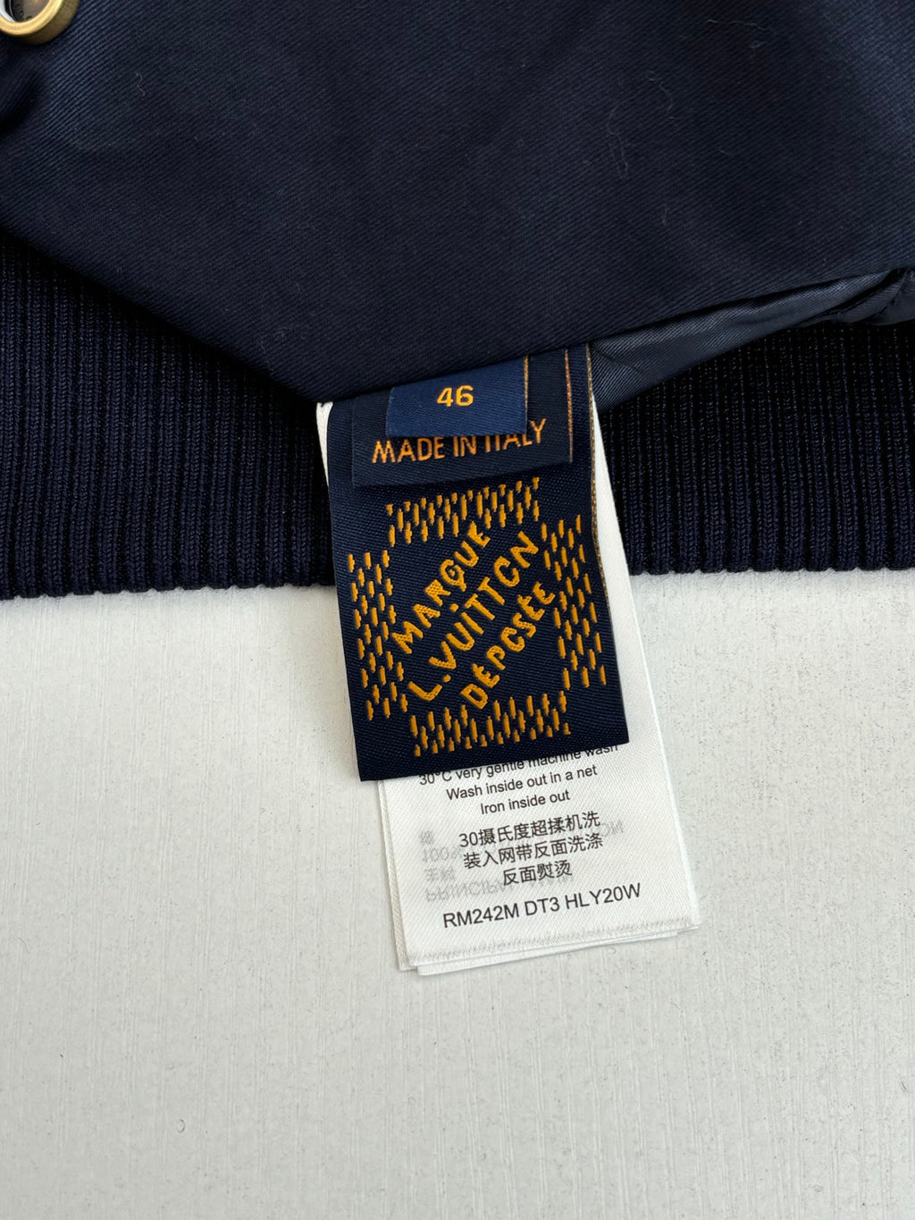 Navy jacket care/size label, Made in Italy, size 46.