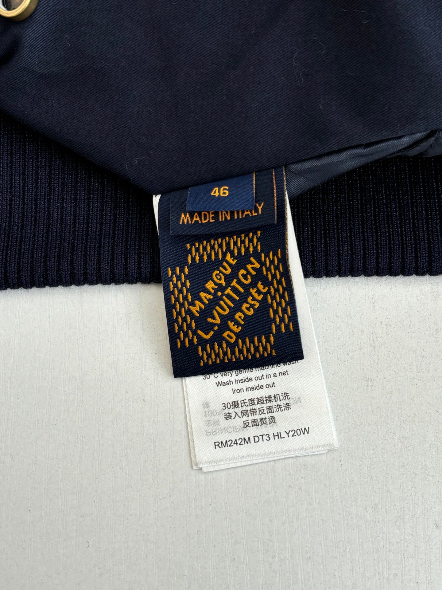 Navy jacket care/size label, Made in Italy, size 46.