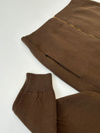 Brown zip-up jacket sleeves and hem with ribbed cuffs and side seam stitching