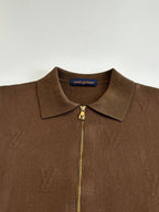 Brown zip-up jacket close-up with stand collar and gold Louis Vuitton zipper