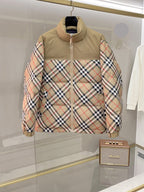 Burberry long jacket with beige upper and multicolor plaid sleeves, zip front