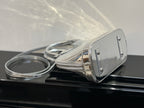 Louis Vuitton monogram handbag with adjustable strap and buckle, silver-tone metal