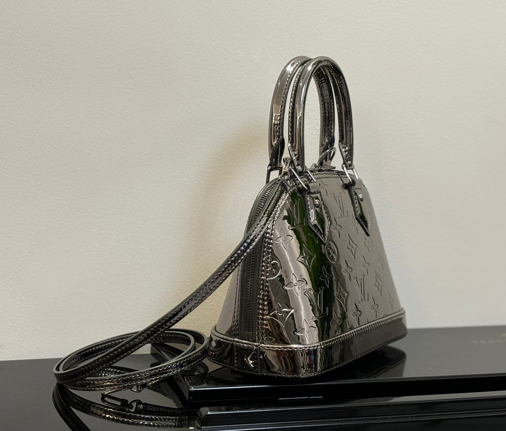 Louis Vuitton mini handbag with top handles and shoulder strap, metallic silver finish